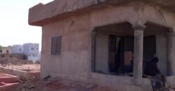 Vente de terrain avec maison inachevée à Kabala non loin de l’Université, en titre foncier Vente de terrain avec maison inachevée à Kabala non loin de l’Université, en titre foncier